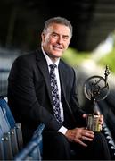 18 July 2025; GPA Lifetime Achievement Award recipient, former Galway hurler, Joe Connolly sits for a portrait with his award during the GPA Hurling and Camogie Legends Lunch at Croke Park in Dublin. Photo by Seb Daly/Sportsfile