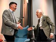 18 July 2025; Former Tipperary hurler Eddie O'Donnell, right, is presented with the GPA Croí Bhríde Award by GPA president Dónal Óg Cusack during the GPA Hurling and Camogie Legends Lunch at Croke Park in Dublin. Photo by Seb Daly/Sportsfile