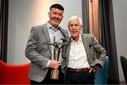 18 July 2025; Former Tipperary hurler Eddie O'Donnell, right, is presented with the GPA Croí Bhríde Award by GPA president Dónal Óg Cusack during the GPA Hurling and Camogie Legends Lunch at Croke Park in Dublin. Photo by Seb Daly/Sportsfile