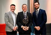 18 July 2025; Former Galway hurler Joe Connolly, centre, is presented with his GPA Lifetime Achievement Award by GPA president Dónal Óg Cusack, left, and GPA chief executive officer Tom Parsons during the GPA Hurling and Camogie Legends Lunch at Croke Park in Dublin. Photo by Seb Daly/Sportsfile