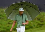 18 July 2025; Haotong Li of China on the 18th green during day two of The 153rd Open Championship at Royal Portrush Golf Club in Portrush, Antrim. Photo by David Fitzgerald/Sportsfile