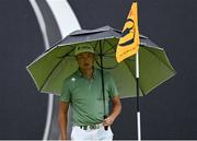 18 July 2025; Haotong Li of China on the 18th green during day two of The 153rd Open Championship at Royal Portrush Golf Club in Portrush, Antrim. Photo by David Fitzgerald/Sportsfile
