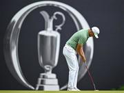 18 July 2025; Haotong Li of China putts on the 18th green during day two of The 153rd Open Championship at Royal Portrush Golf Club in Portrush, Antrim. Photo by David Fitzgerald/Sportsfile