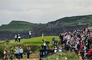 18 July 2025; Shane Lowry of Ireland watches his tee shot on the seventh hole during day two of The 153rd Open Championship at Royal Portrush Golf Club in Portrush, Antrim. Photo by Ramsey Cardy/Sportsfile