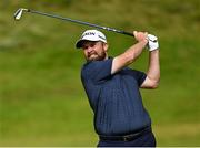 18 July 2025; Shane Lowry of Ireland watches his shot from the seventh fairway during day two of The 153rd Open Championship at Royal Portrush Golf Club in Portrush, Antrim. Photo by Ramsey Cardy/Sportsfile