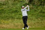18 July 2025; Scottie Scheffler of USA plays a shot from the seventh fairway during day two of The 153rd Open Championship at Royal Portrush Golf Club in Portrush, Antrim. Photo by Ramsey Cardy/Sportsfile