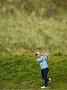 18 July 2025; Collin Morikawa of USA plays a shot from the rough on the seventh hole during day two of The 153rd Open Championship at Royal Portrush Golf Club in Portrush, Antrim. Photo by Ramsey Cardy/Sportsfile
