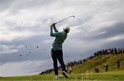 18 July 2025; Collin Morikawa of USA watches his shot from the seventh fairway during day two of The 153rd Open Championship at Royal Portrush Golf Club in Portrush, Antrim. Photo by Ramsey Cardy/Sportsfile