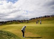 18 July 2025; Scottie Scheffler of USA chips onto the seventh green during day two of The 153rd Open Championship at Royal Portrush Golf Club in Portrush, Antrim. Photo by Ramsey Cardy/Sportsfile