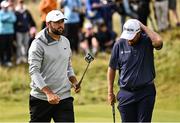 18 July 2025; Scottie Scheffler of USA and Shane Lowry of Ireland on the seventh green during day two of The 153rd Open Championship at Royal Portrush Golf Club in Portrush, Antrim. Photo by Ramsey Cardy/Sportsfile