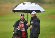 18 July 2025; Shane Lowry of Ireland with his caddie Darren Reynolds during day two of The 153rd Open Championship at Royal Portrush Golf Club in Portrush, Antrim. Photo by Ramsey Cardy/Sportsfile