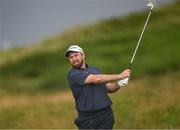 18 July 2025; Shane Lowry of Ireland plays a shot on the 12th hole during day two of The 153rd Open Championship at Royal Portrush Golf Club in Portrush, Antrim. Photo by Ramsey Cardy/Sportsfile