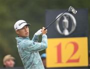 18 July 2025; Collin Morikawa of USA watches his tee shot on the 12th hole during day two of The 153rd Open Championship at Royal Portrush Golf Club in Portrush, Antrim. Photo by Ramsey Cardy/Sportsfile