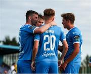 18 July 2025; Conan Noonan of Waterford, 20, is congratulated by teammates after scoring his sides second goal during the Sports Direct Men’s FAI Cup second round match between Waterford and St Mochta’s at the Regional Sports Centre in Waterford. Photo by Michael P Ryan/Sportsfile