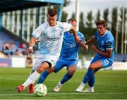 18 July 2025; Tyler Doherty of St Mochta's in action against Rowan McDonald, left, and Finlay Armstrong of Waterford during the Sports Direct Men’s FAI Cup second round match between Waterford and St Mochta’s at the Regional Sports Centre in Waterford. Photo by Michael P Ryan/Sportsfile