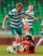 18 July 2025; Wexford goalkeeper Paul Martin in action against Michael Noonan of Shamrock Rovers during the Sports Direct Men’s FAI Cup second round match between Shamrock Rovers and Wexford at Tallaght Stadium in Dublin. Photo by Thomas Flinkow/Sportsfile