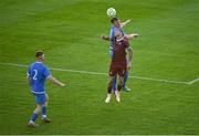 18 July 2025; Sean Heaney of Tolka Rovers in action against Stephen Walsh of Galway United during the Sports Direct Men’s FAI Cup second round match between Galway United and Tolka Rovers at Eamonn Deacy Park in Galway. Photo by Piaras Ó Mídheach/Sportsfile