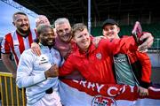 18 July 2025; Dipo Akinyemi of Derry City with supporters after the Sports Direct Men’s FAI Cup second round match between Treaty United and Derry City at Markets Field in Limerick. Photo by Stephen McCarthy/Sportsfile