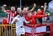 18 July 2025; Dipo Akinyemi of Derry City with supporters after the Sports Direct Men’s FAI Cup second round match between Treaty United and Derry City at Markets Field in Limerick. Photo by Stephen McCarthy/Sportsfile
