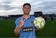 18 July 2025; Colm Whelan of Bohemians celebrates with the matchball after scoring a hat-trick during the Sports Direct Men’s FAI Cup second round match between Killester Donnycarney and Bohemians at Dalymount Park in Dublin. Photo by Seb Daly/Sportsfile