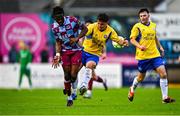 18 July 2025; Thomas Oluwa of Drogheda United is tackled by Jamie Whelan of Crumlin United during the Sports Direct Men’s FAI Cup second round match between Drogheda United and Crumlin United at Sullivan & Lambe Park in Drogheda, Louth. Photo by Tyler Miller/Sportsfile