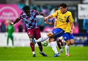 18 July 2025; Thomas Oluwa of Drogheda United is tackled by Jamie Whelan of Crumlin United during the Sports Direct Men’s FAI Cup second round match between Drogheda United and Crumlin United at Sullivan & Lambe Park in Drogheda, Louth. Photo by Tyler Miller/Sportsfile
