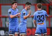 18 July 2025; Colm Whelan of Bohemians, centre, celebrates with teammates Josh Harper, left, and Christopher Conlan after scoring their side's seventh goal during the Sports Direct Men’s FAI Cup second round match between Killester Donnycarney and Bohemians at Dalymount Park in Dublin. Photo by Seb Daly/Sportsfile