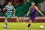 18 July 2025; Graham Burke of Shamrock Rovers in action against Harry Sherlock of Wexford during the Sports Direct Men’s FAI Cup second round match between Shamrock Rovers and Wexford at Tallaght Stadium in Dublin. Photo by Thomas Flinkow/Sportsfile