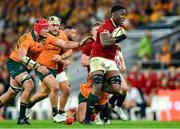 19 July 2025; Maro Itoje of British & Irish Lions breaks away from the tackle of Australia's Harry Wilson during the first test match between Australia and the British & Irish Lions at Suncorp Stadium in Brisbane, Australia. Photo by Brendan Moran/Sportsfile