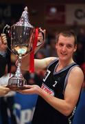 25 January 1998; Denny Notre Dame captain Albert Carrigan lifts the cup following the Senior Men's Sprite National Cup Final between Denny Notre Dame and Neptune at the National Basketball Arena in Tallaght, Dublin. Photo By Brendan Moran/Sportsfile.