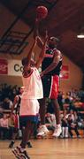 24 October 1998; Anthony Jenkins of Denny Notre Dame shoots for a baskest despite the efforts of Dion WIngfield of Blue Demons during the ESB Superleague Basketball match between Denny Notre Dame and Blue Demons at the National Basketball Arena in Tallaght. Photo By Brendan Moran/Sportsfile.