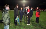 15 January 1999; Referee John Stacey with officials from both clubs after he called off the Harp Lager National League Premier Division match between Bohemians and Derry City at Dalymount Park in Dublin. Photo by Ray McManus/Sportsfile.