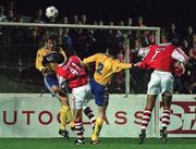 18 September 1998; Brendan Place of Bohemians, left, clears the ball under pressure from Ian Gilzean, 41, and Paul Osam, 7, of St Patrick's Athletic during the Harp Lager National League Premier Division match between St Patrick's Athletic and Bohemians at Richmond Park in Dublin. Photo by Brendan Moran/Sportsfile.