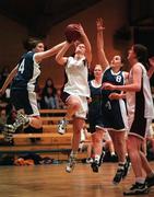 25th January 1998; Carina Daly of Tullamore shoots for a basket despite the attentions of Lenora Gibbons, left, and Maria Hayes of Castlebar during the Junior Women's National Cup Final between Tullamore and Castlebar at the Sprite Cup Finals at the National Basketball Arena in Tallaght, Dublin. Photo by Brendan Moran/Sportsfile.