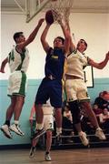 11 October 1998; Chris Doyal of St Vincent's in action against Dave Weaver, left, and Shane O'Meara of Sligo Dairies during the ESB Basketball Superleague match between St Vincent's and Sligo Dairies at St Vincent's Basketball Club in Glasnevin, Dublin. Photo By Brendan Moran/Sportsfile.