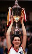 25 January 1998; Wildcats captain Christine Kiely lifts the cup following the Sprite Women's Senior National Cup Final between Snowcream Waterford Wildcats and Opennet Naomh Mhuire at the National Basketball Arena in Tallaght, Dublin. Photo by Brendan Moran/Sportsfile