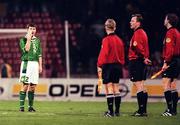 18 November 1998; Denis Irwin of Republic of Ireland questions referee Karl Erik Nilson, second from right, about 3 penalty appeals during the UEFA Euro 2000 Group 8 Qualifier between Yugoslavia and Republic of Ireland at the Red Star Stadium, in Belgrade, Yugoslavia. Photo by David Maher/Sportsfile
