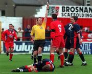 11 October 1998; Referee Dick O'Hanlon shows Pat Scully of Shelbourne, far right, a red card for a challenge on Trevor Molloy of St Patrick's Athletic during the Harp Lager National League Premier Division match between Shelbourne and St Patrick's Athletic at Tolka Park in Dublin. Photo by David Maher/Sportsfile.