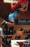 7 November 1998; Joseph Haastrup of Dublin Bay Vikings hangs from the basket after scoring a Slam-Dunk during the ESB Superleague Basketball game between Dublin Bay Vikings and Waterford Crystal at the National Basketball Arena in Tallaght, Dublin. Photo by Brendan Moran/Sportsfile.