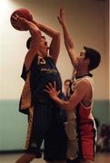 17 January 1999; Karl Donnelly of St Vincent's in action against Adrian Fulton of Star of The Sea during the ESB Men's Superleague basketball match between St Vincent's and Star of The Sea at St Vincent's Basketball Club in Glasnevin, Dublin. Photo By Brendan Moran/Sportsfile.