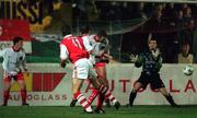 23 October 1998; Ian Gilzean of St Patrick's Athletic flicks the ball on to Trevor Molloy to score his side's opening goal during the Harp Lager National League Premier Division match between St Patrick's Athletic and Cork City at Richmond Park in Dublin. Photo by David Maher/Sportsfile.