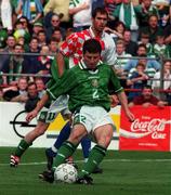5 September 1998; Denis Irwin of Republic of Ireland shoots to score his sides first goal from the penalty spot during the UEFA EURO 2000 Group 8 Qualifier between Republic of Ireland and Croatia at Lansdowne Road in Dublin. Photo by David Maher/Sportsfile.