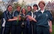 20 April 1998; Members of the Ireland Under 18 Women's basketball team, from left, Eimear Burke, Vanessa Burke, Denise Walsh, Susan Moran, Clare McLoughlin, and Siobhan Kilkenny, with the cup during the homecoming of Ireland Under-18 Basketball Team, after winning the 4 Nations Tournament in Wales, at Dublin Airport in Dublin. Photo by Matt Browne/Sportsfile.