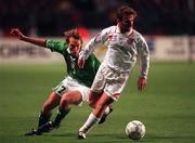 14 October 1998; Jason McAteer of Republic of Ireland in action against Antoine Zahra of Malta during the UEFA Euro 2000 Group 8 Qualifier between Republic of Ireland and Malta at Lansdowne Road in Dublin. Photo by David Maher/Sportsfile.