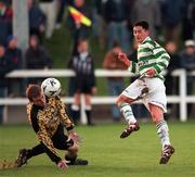 17 January 1999; Jason Sherlock of Shamrock Rovers chips UCD goalkeeper Barry Ryan, however the goal was subsequently disallowed for offside, during the Harp Lager National League Premier Division match between UCD and Shamrock Rovers at Belfield Park in Dublin. Photo by Ray McManus/Sportsfile