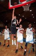 14 November 1998; Mike Trimmer of Killester shoots a lay-up despite the efforts of, from left, Joseph Haastrup, Kevin Byrne and Ed Randolph of Dublin Bay Vikings during the ESB Superleague Basketball match between Dublin Bay Vikings and Killester at the National Basketball Arena in Tallaght, Dublin. Photo By Brendan Moran/Sportsfile.