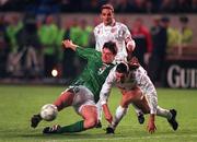 14 October 1998; Niall Quinn of Republic of Ireland in action against Darren Debona of Malta during the UEFA Euro 2000 Group 8 Qualifier between Republic of Ireland and Malta at Lansdowne Road in Dublin. Photo by Matt Browne/Sportsfile.