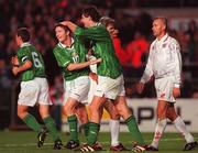 14 October 1998; Niall Quinn of Republic of Ireland, right, celebrates with team-mate Robbie Keane, second from left, after scoring his side's fourth goal during the UEFA Euro 2000 Group 8 Qualifier between Republic of Ireland and Malta at Lansdowne Road in Dublin. Photo by David Maher/Sportsfile.