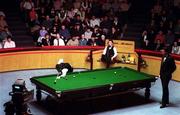 29 March 1998; Ronnie O'Sullivan lines up a pot as Ken Doherty watches on during the Benson and Hedges Irish Masters Snooker Final between Ronnie O'Sullivan and Ken Doherty at Goffs in Kill, Kildare. Photo by Matt Browne/Sportsfile