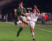 14 October 1998; Roy Keane of Republic of Ireland in action against Noel Turner of Malta during the UEFA Euro 2000 Group 8 Qualifier between Republic of Ireland and Malta at Lansdowne Road in Dublin. Photo by Brendan Moran/Sportsfile.